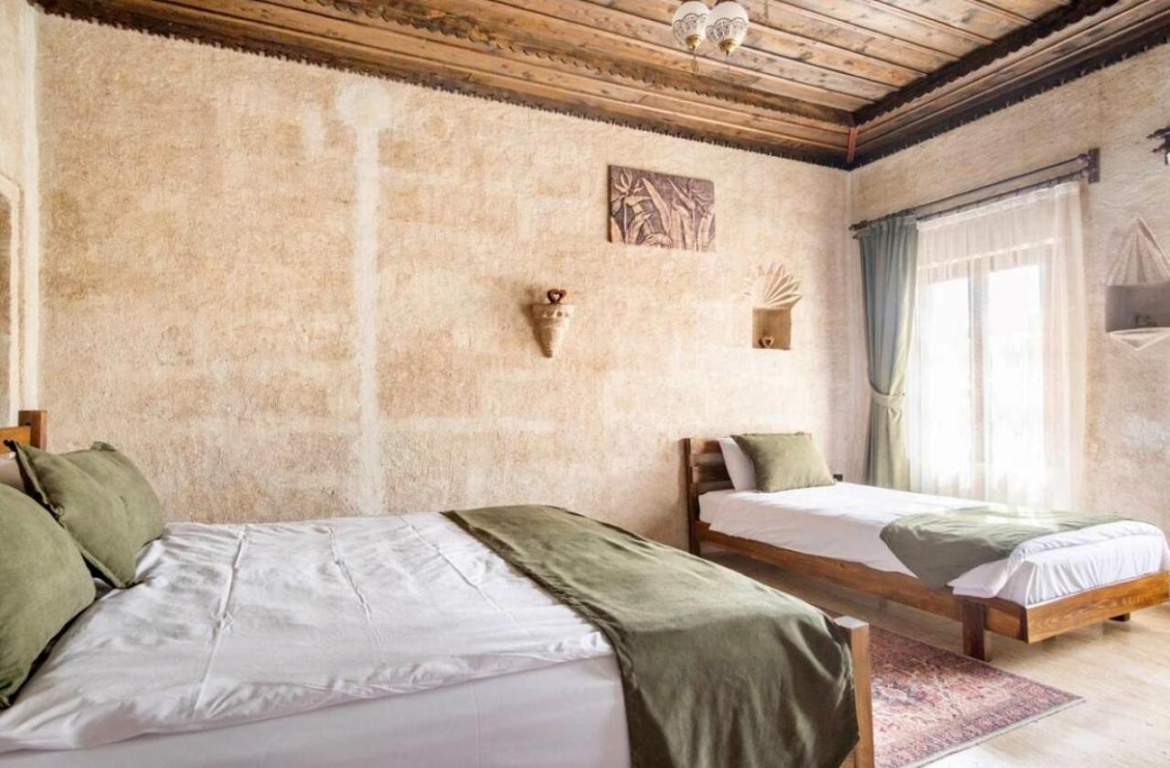 Uzay Cave Suite Hotel อูร์กุบ ภายนอก รูปภาพ